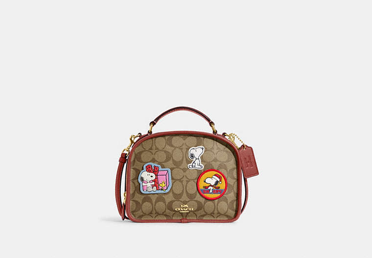 COACH®,COACH X PEANUTS LUNCH PAIL IN SIGNATURE CANVAS WITH PATCHES,Signature Coated Canvas,Medium,Gold/Khaki/Redwood Multi,Front View