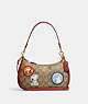 COACH®,COACH X PEANUTS TERI SHOULDER BAG IN SIGNATURE CANVAS WITH PATCHES,Signature Coated Canvas,Small,Gold/Khaki/Redwood Multi,Front View