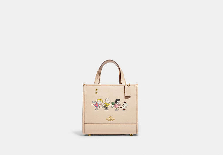COACH®,COACH X PEANUTS DEMPSEY TOTE BAG 22 WITH SNOOPY AND FRIENDS MOTIF,Refined Pebble Leather,Medium,Gold/Ivory Multi,Front View