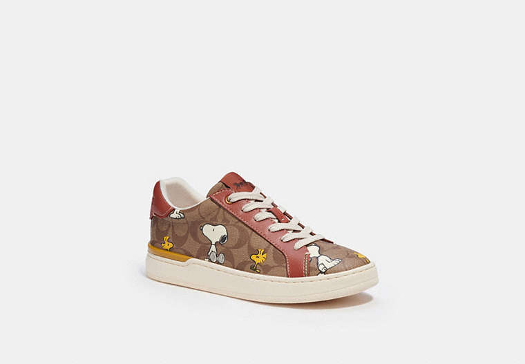 COACH®,COACH X PEANUTS CLIP LOW TOP SNEAKER IN SIGNATURE CANVAS WITH SNOOPY WOODSTOCK PRINT,Signature Coated Canvas,Khaki/ Terracotta,Front View