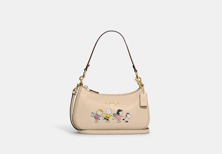 COACH®,COACH X PEANUTS TERI SHOULDER BAG WITH SNOOPY AND FRIENDS MOTIF,Refined Pebble Leather,Small,Gold/Ivory Multi,Front View