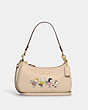 COACH®,COACH X PEANUTS TERI SHOULDER BAG WITH SNOOPY AND FRIENDS MOTIF,Refined Pebble Leather,Medium,Gold/Ivory Multi,Front View
