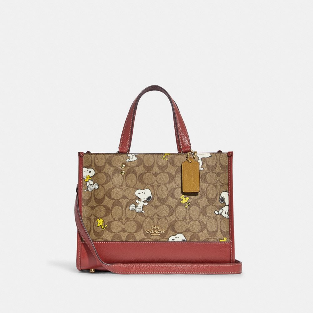 Coach X Peanuts Dempsey Carryall Bag In Signature Canvas With Snoopy Woodstock Print