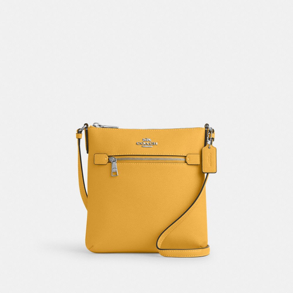 Shop Coach Outlet Mini Rowan File Bag In Yellow