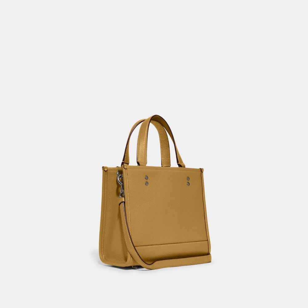 COACH®,Coach X Peanuts Dempsey Tote Bag 22 With Snoopy Present Motif,,Angle View