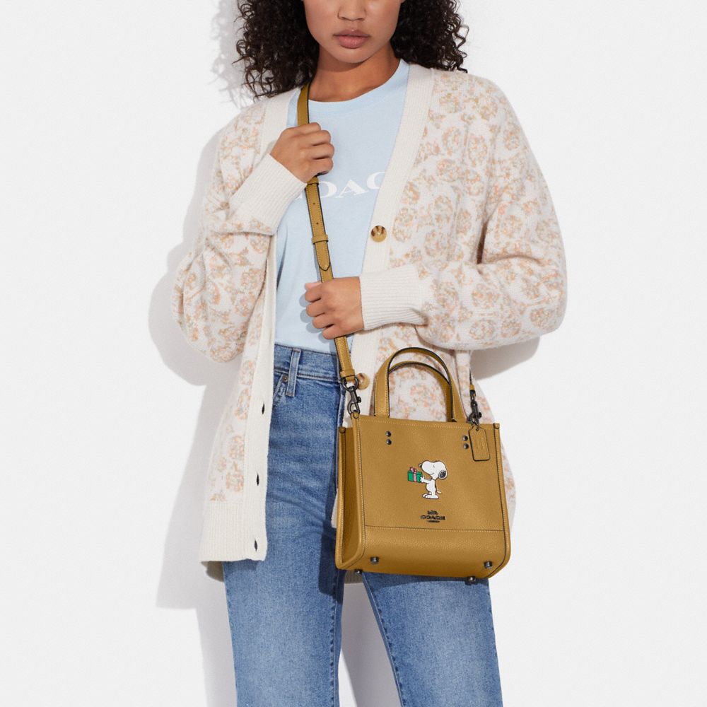 COACH®,Coach X Peanuts Dempsey Tote Bag 22 With Snoopy Present Motif,,Detail View