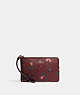COACH®,CORNER ZIP WRISTLET WITH HOLIDAY BELLS PRINT,Printed Coated Canvas,Mini,Gold/Black Cherry Multi,Front View