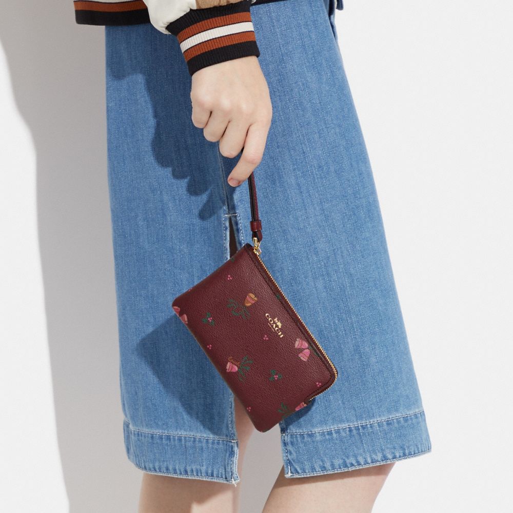 COACH®,Corner Zip Wristlet With Holiday Bells Print,,Detail View