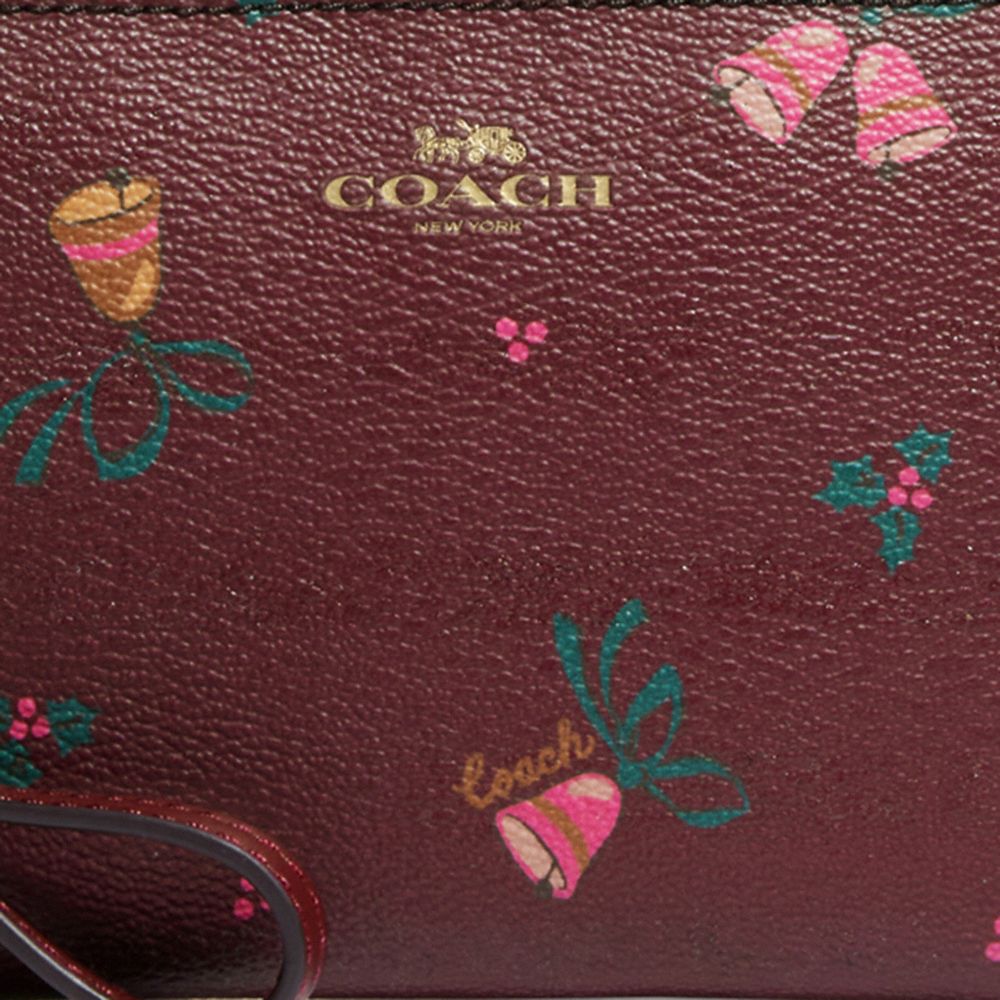 COACH®,Corner Zip Wristlet With Holiday Bells Print,,Detail View