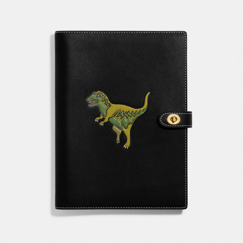 COACH®,NOTEBOOK WITH REXY,Glovetanned Leather,Brass/Black,Front View