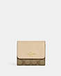 COACH®,SMALL TRIFOLD WALLET IN BLOCKED SIGNATURE CANVAS,Signature Coated Canvas,Mini,Im/Khaki/Ivory,Front View