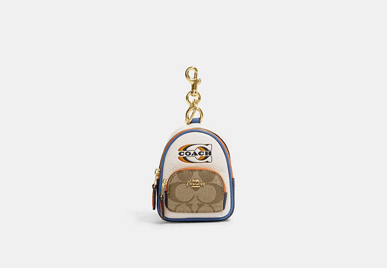 COACH®,MINI COURT BACKPACK BAG CHARM IN SIGNATURE CANVAS WITH COACH STAMP,Gold/Khaki Chalk Multi,Front View