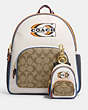 COACH®,MINI COURT BACKPACK BAG CHARM IN SIGNATURE CANVAS WITH COACH STAMP,Gold/Khaki Chalk Multi,Angle View