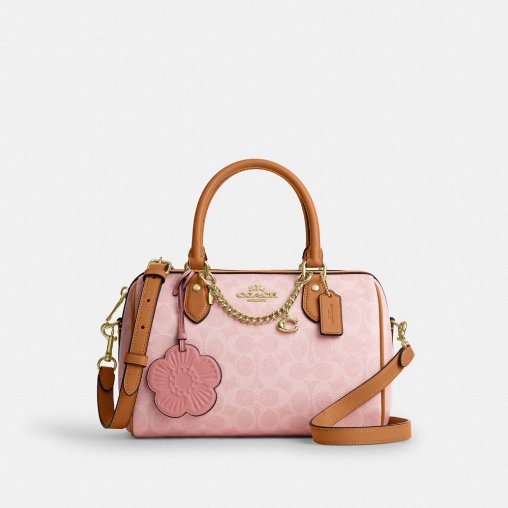 COACH®,Rowan Satchel Bag In Signature Canvas With Charms,Recycled Polyester,Leather,Canvas,Barrel Bag,Chain Detail,Metal,L...,Pink,Front View
