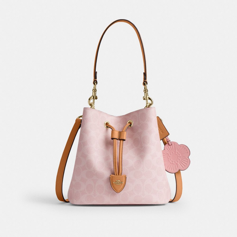 COACH®,Rowan Bucket Bag In Signature Canvas With Charms,,Front View