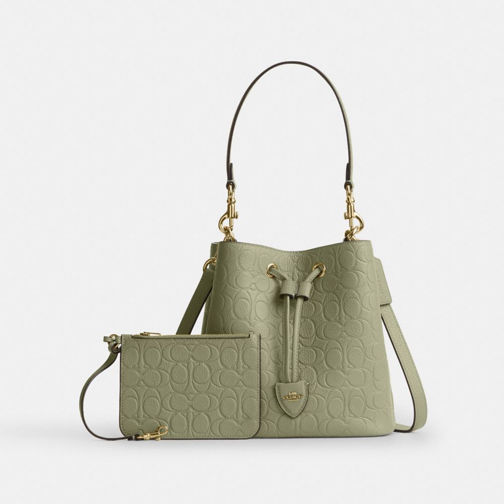 COACH®,Rowan Bucket Bag In Signature Leather,,Angle View