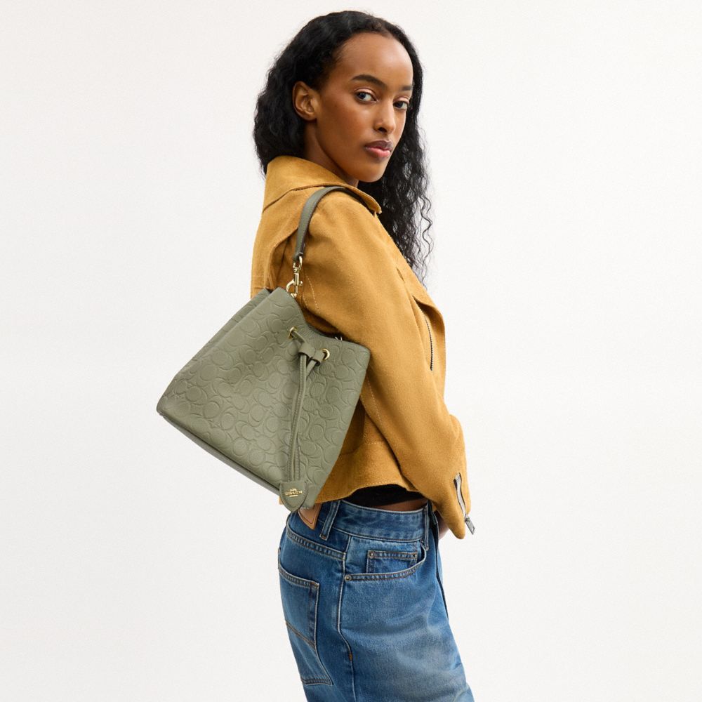 Rowan Bucket Bag In Signature Leather