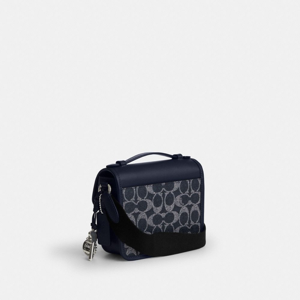 COACH®,Racer Crossbody Bag In Signature Canvas With Charms,,Angle View