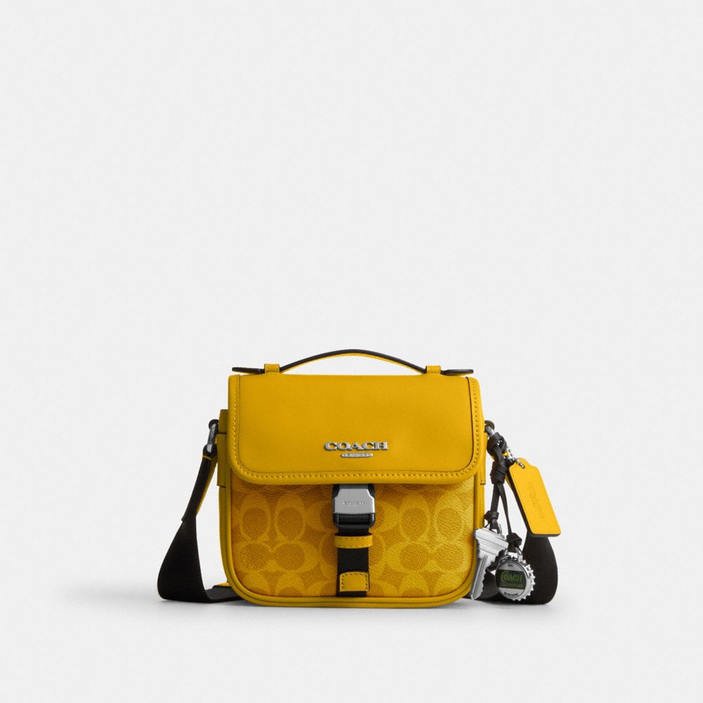 COACH®,Racer Crossbody Bag In Signature Canvas With Charms,,Front View