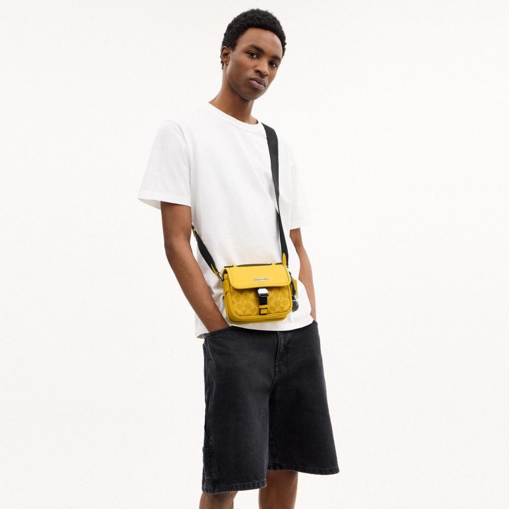 COACH®,Racer Crossbody Bag In Signature Canvas With Charms,Yellow,Detail View