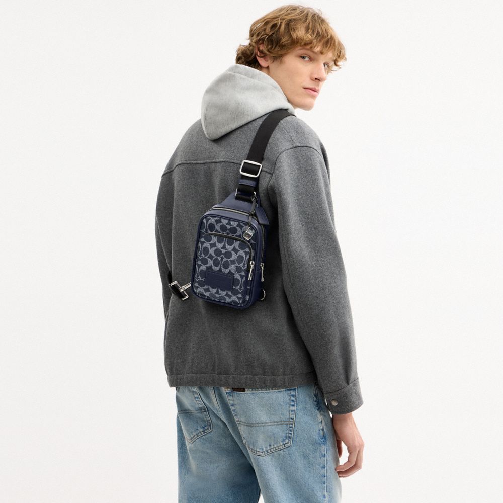 COACH®,Racer Sling Pack In Signature Canvas With Charms,,Detail View