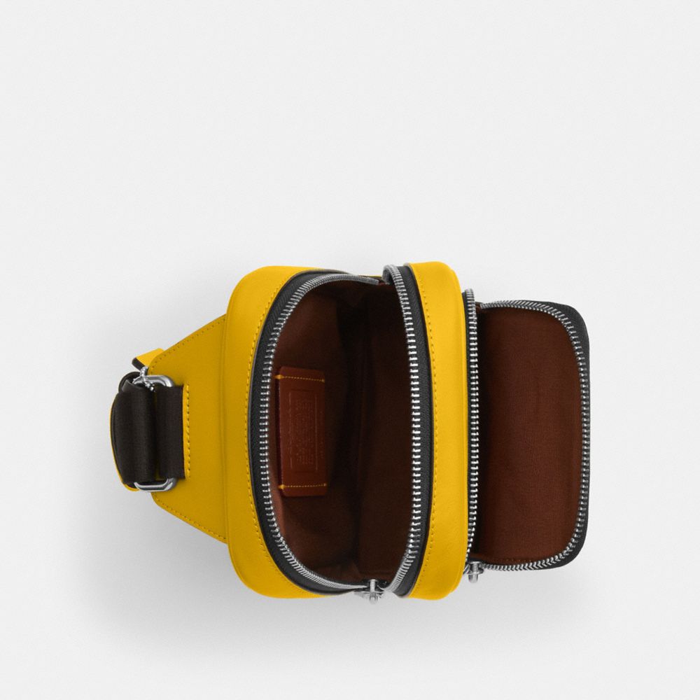 COACH®,Racer Sling Pack In Signature Canvas With Charms,,Inside View,Top View