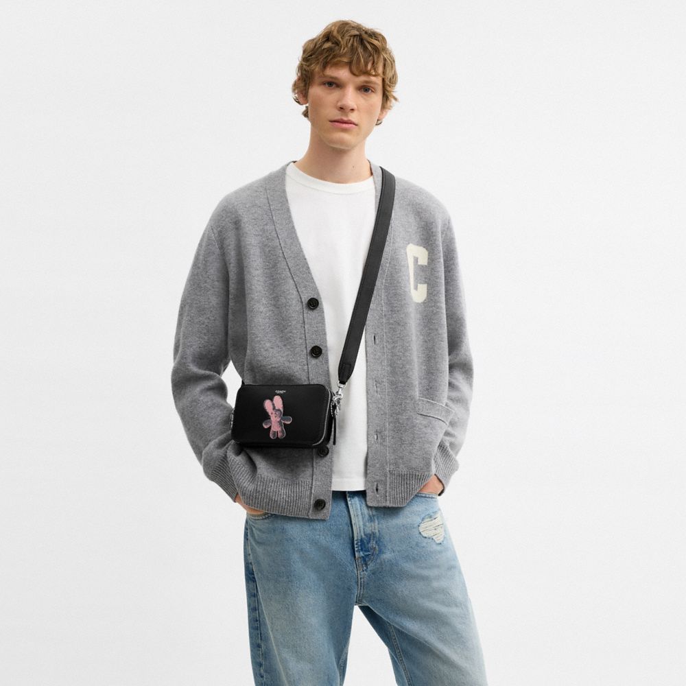 COACH®,Clinton Crossbody Bag With Floppy Graphic,Leather,Crossbody,Pendant,Compact,Sustainable,Adjustable,Silver Metal,Casual,Black,Detail View