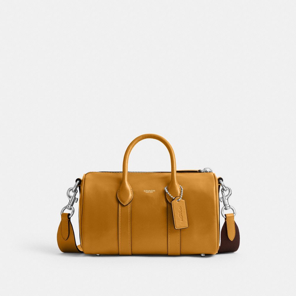 COACH®,Compass Bag 25,Leather,Recycled Polyester,Bowler Bag,Metal Material,Pendant,Adjustable,Silver Metal,Mustard,Front View