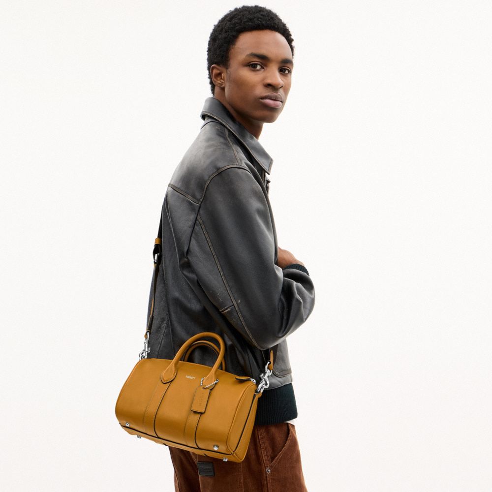 COACH®,Compass Bag 25,Leather,Recycled Polyester,Bowler Bag,Metal Material,Pendant,Adjustable,Silver Metal,Mustard,Detail View