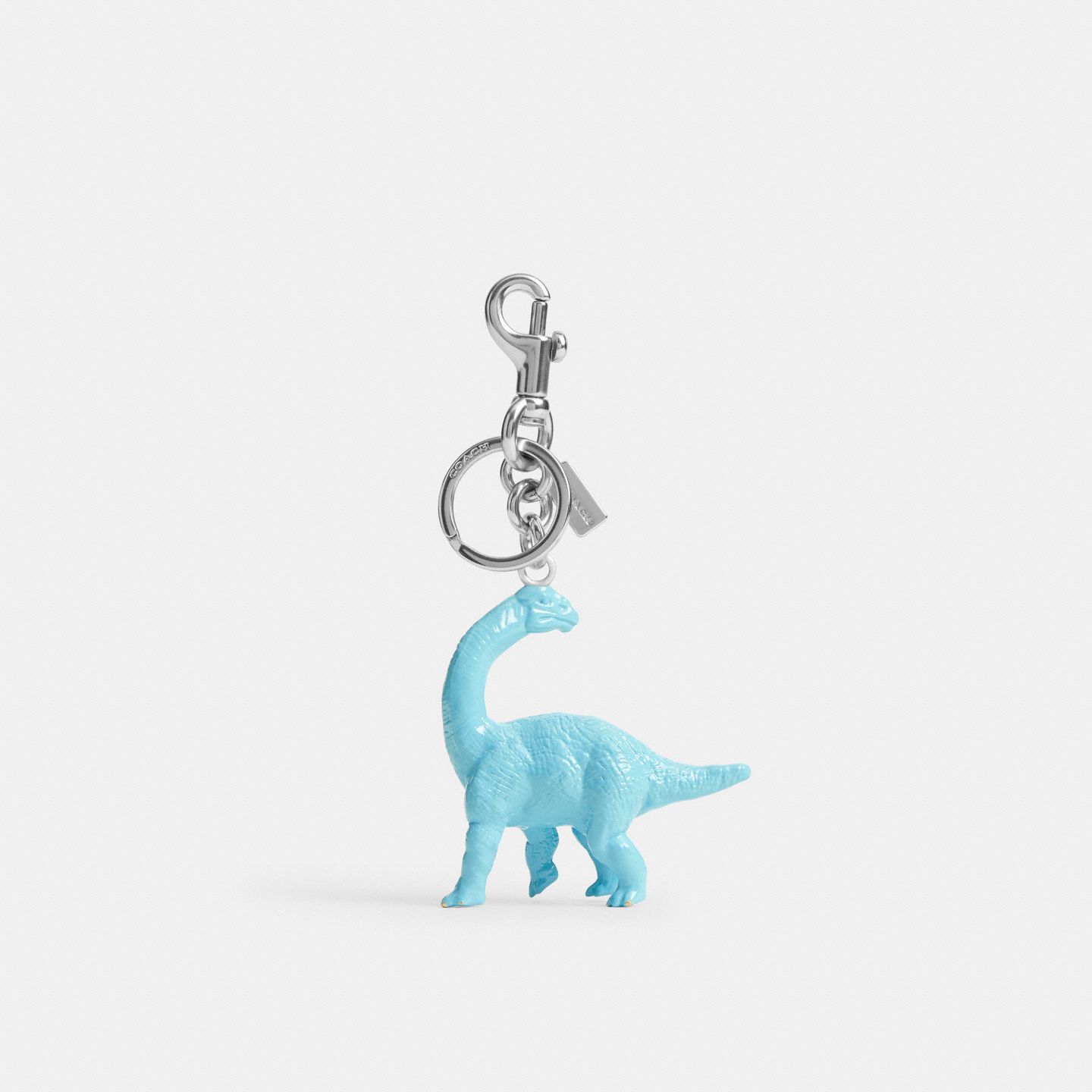 Женский брелок Coach Dinosaur Bag Charm, цвет: Серебряный — фото 1
