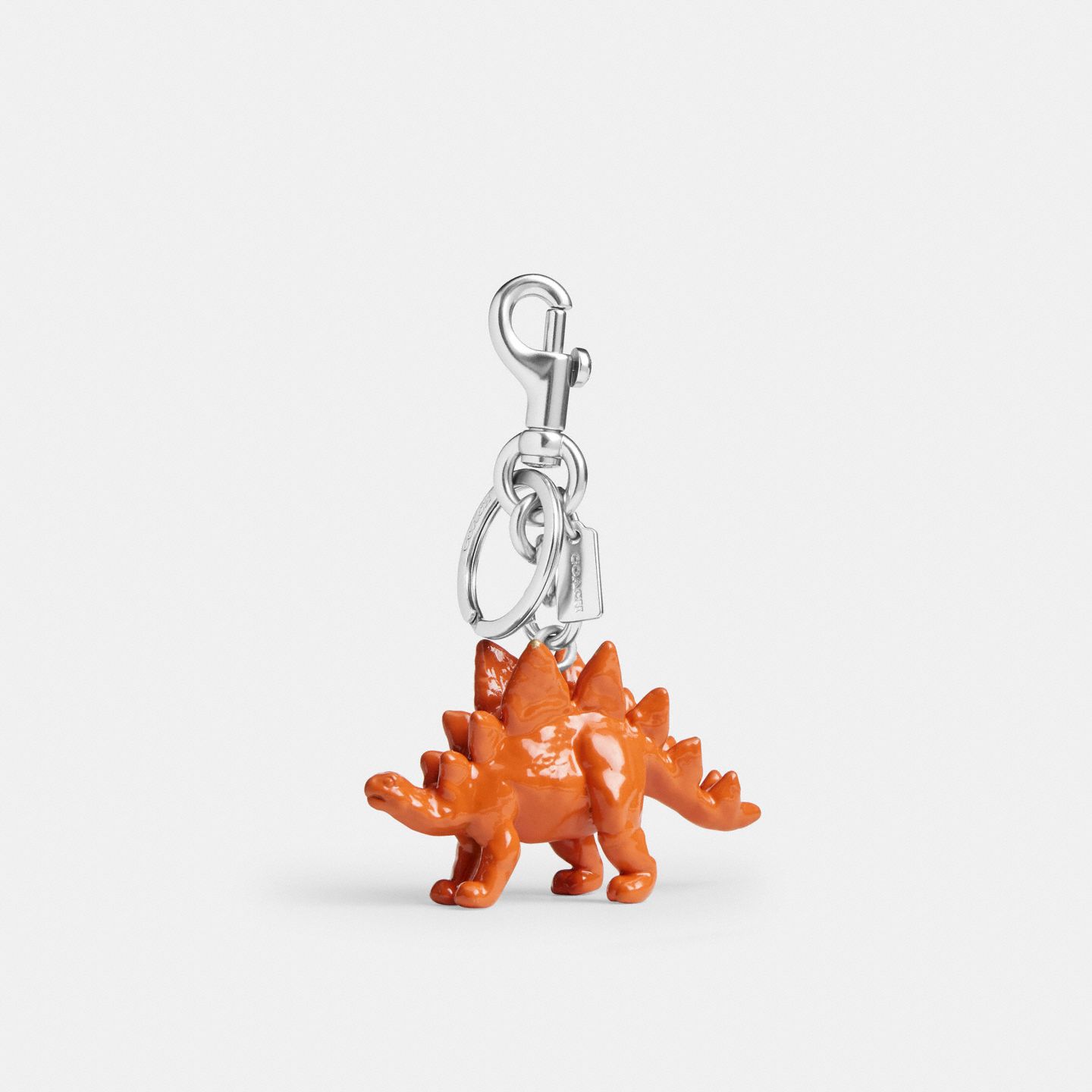 Женский брелок Coach Stegosaurus Bag Charm, цвет: Серебряный — фото 1