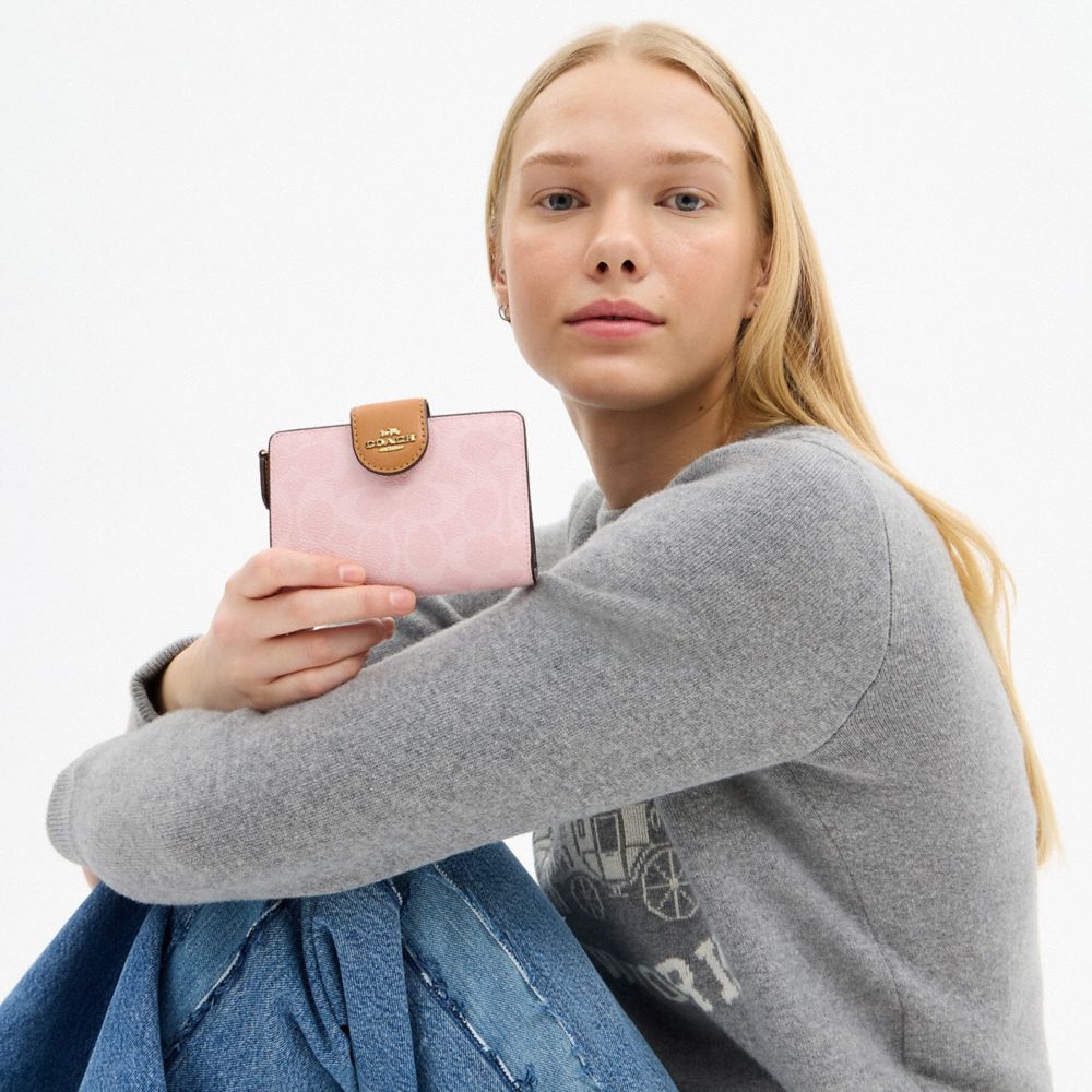 COACH®,Medium Corner Zip Wallet In Signature Canvas,Canvas,Leather,Coin,Metal,Logo,Casual,Pink,Detail View
