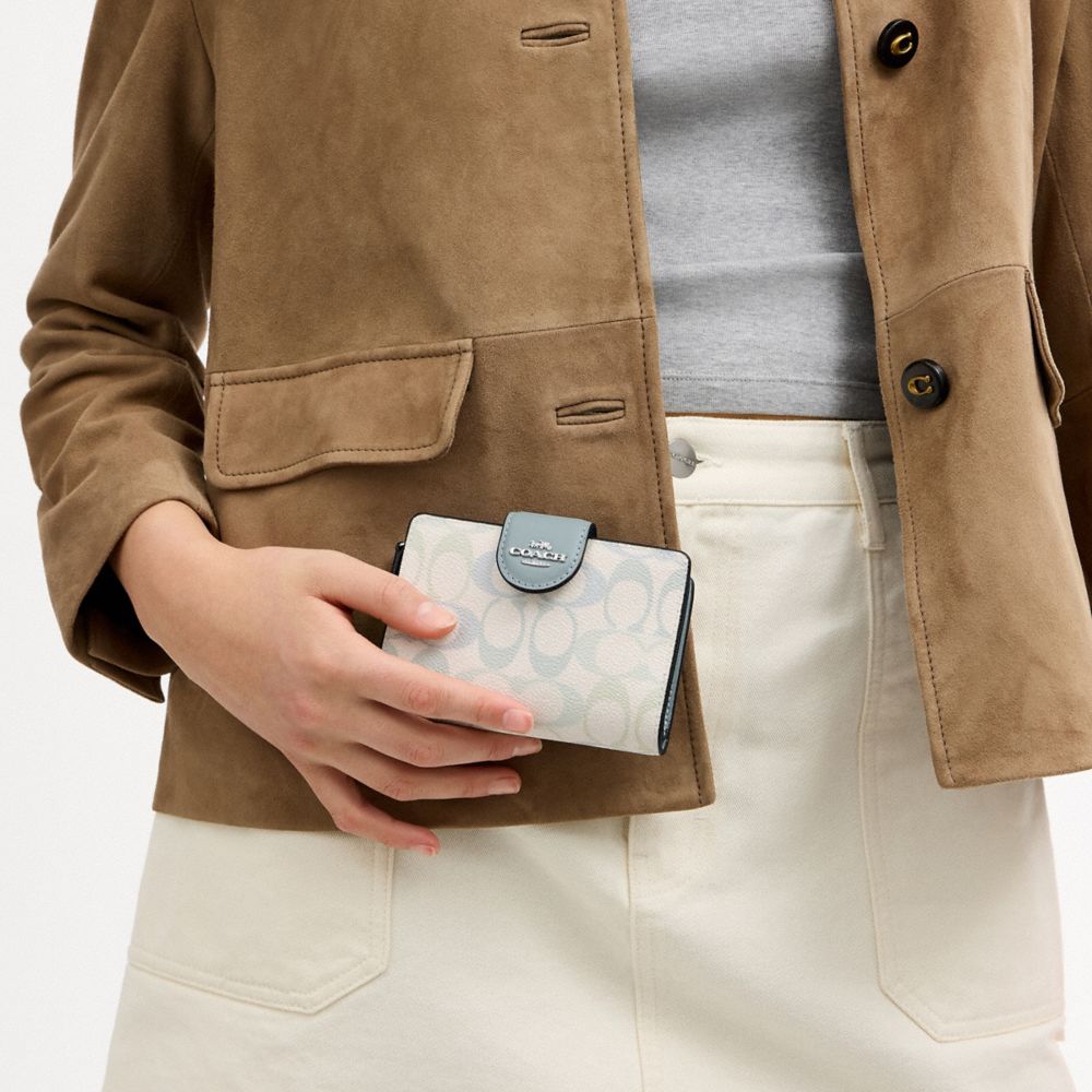 COACH®,Medium Corner Zip Wallet In Pretty Signature Canvas,,Detail View