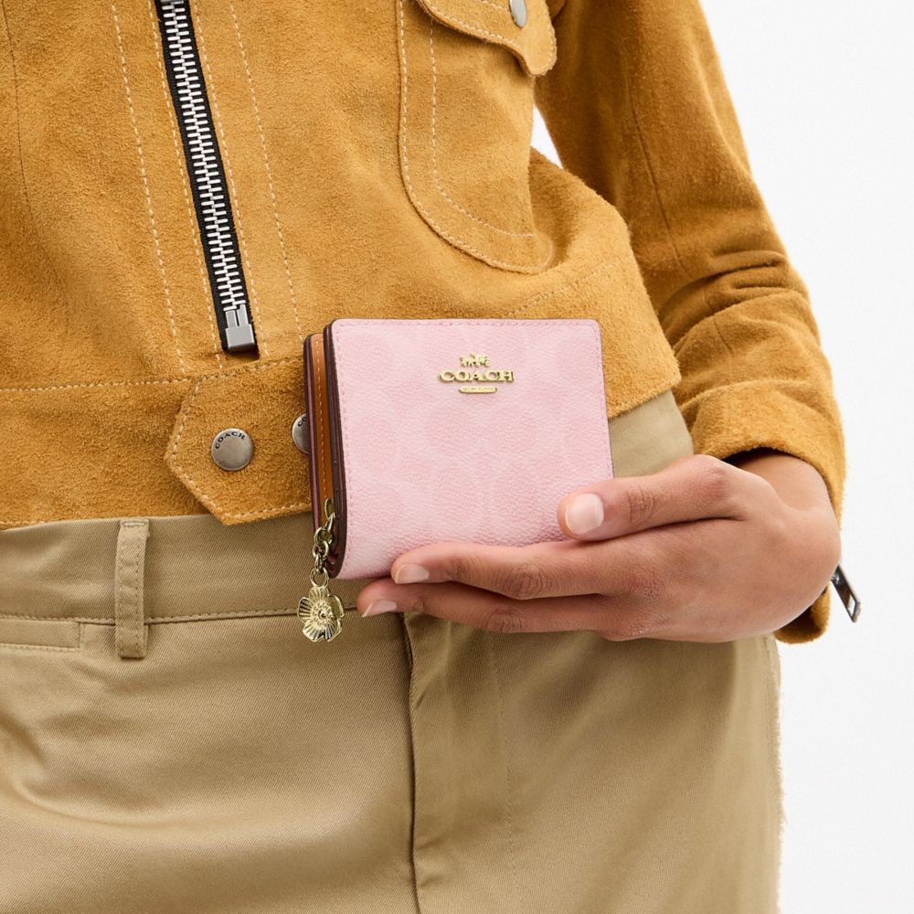 COACH®,Snap Wallet In Signature Canvas With Charm,Canvas,Leather,Bi Fold,Pendant,Metal,Logo,Casual,Pink,Detail View
