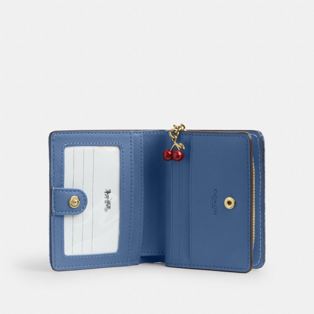 COACH®,Snap Wallet In Loved Denim With Charm,Leather,Cotton,Denim,Bi Fold,Pendant,Logo,Metal,Sustainable,Casual,Blue,Inside View,Top View
