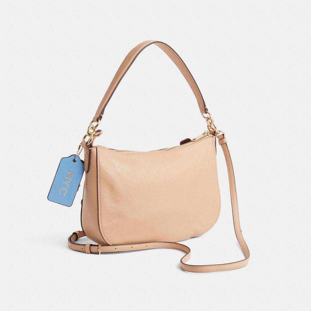 COACH®,Upcrafted Chelsea Crossbody,Beige,Angle View