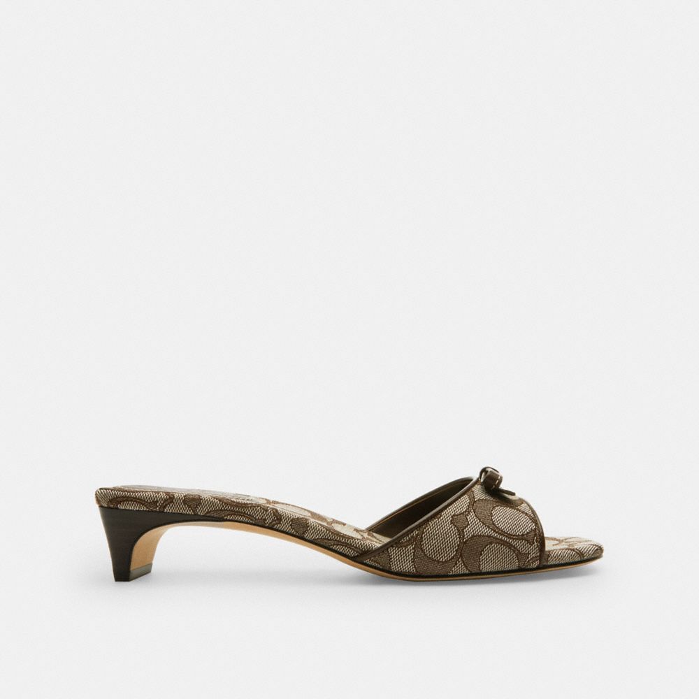 COACH®,Bow Kitten Heel Sandal In Signature Jacquard,Rubber,Polyester,Faux Leather,Cotton,Lining Leather,Lining Recycled Po...,Brown,Angle View