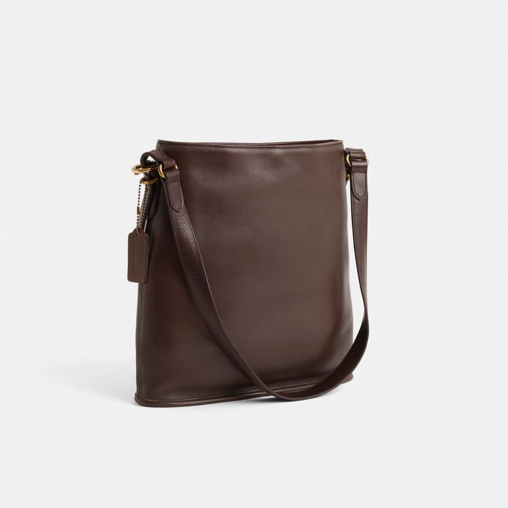 COACH®,Vintage Equestrian Slim Bucket Bag,Brown,Angle View