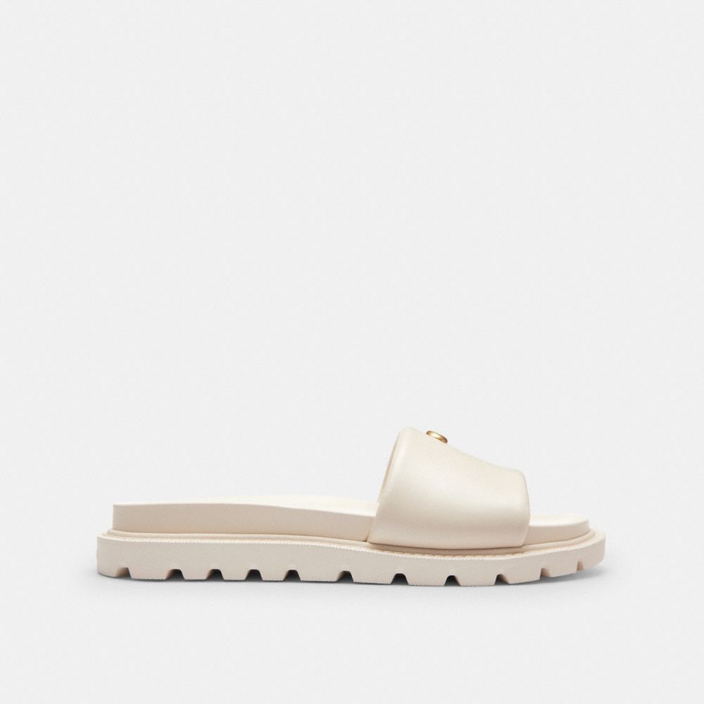 COACH®,Brynn Slide Sandal,Rubber,Slides,Logo,Metal,Cushioned,Flexible,Casual,Cream,Angle View