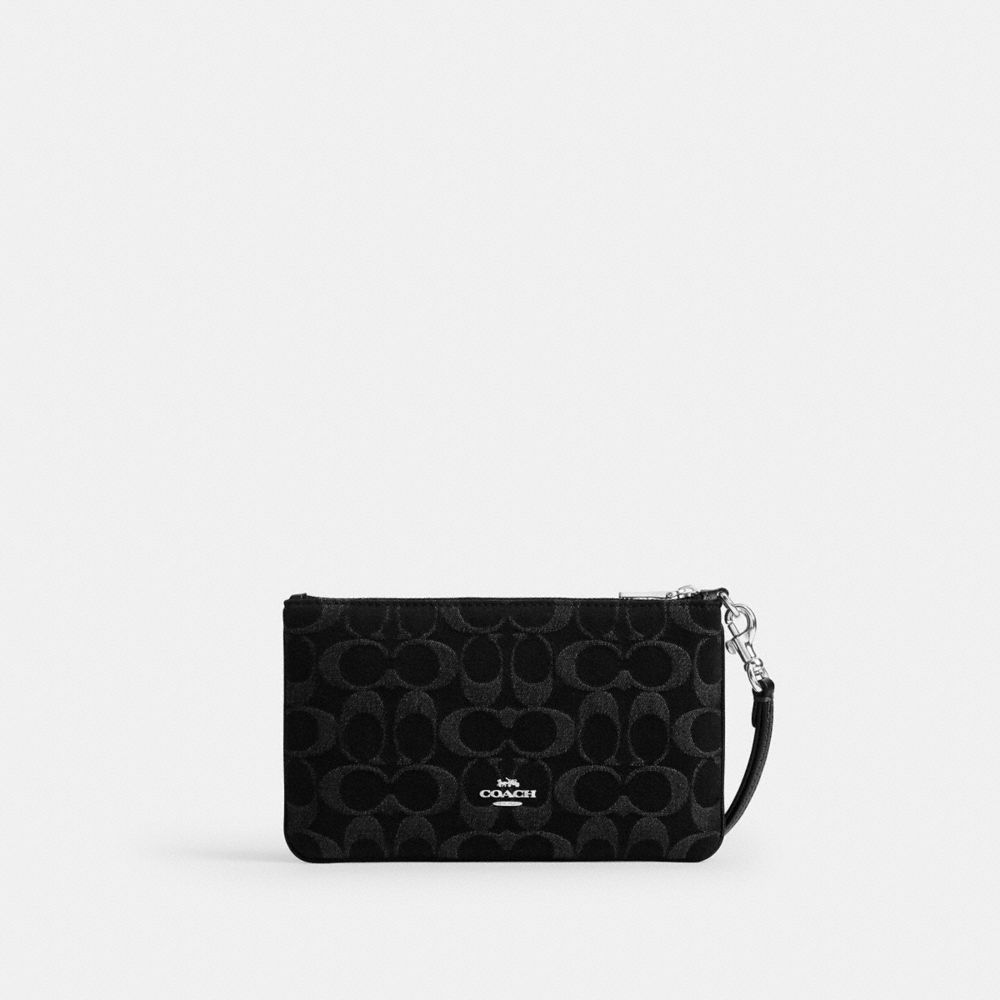 COACH®,Ashton Wristlet In Signature Denim,,Back View