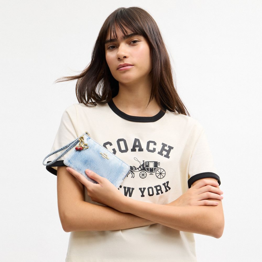 COACH®,Corner Zip Wristlet In Loved Denim With Charms,Denim,Recycled Polyester,Cotton,Pouch,Wristlet,Metal,Pendant,Logo,Ca...,Turquoise,Detail View