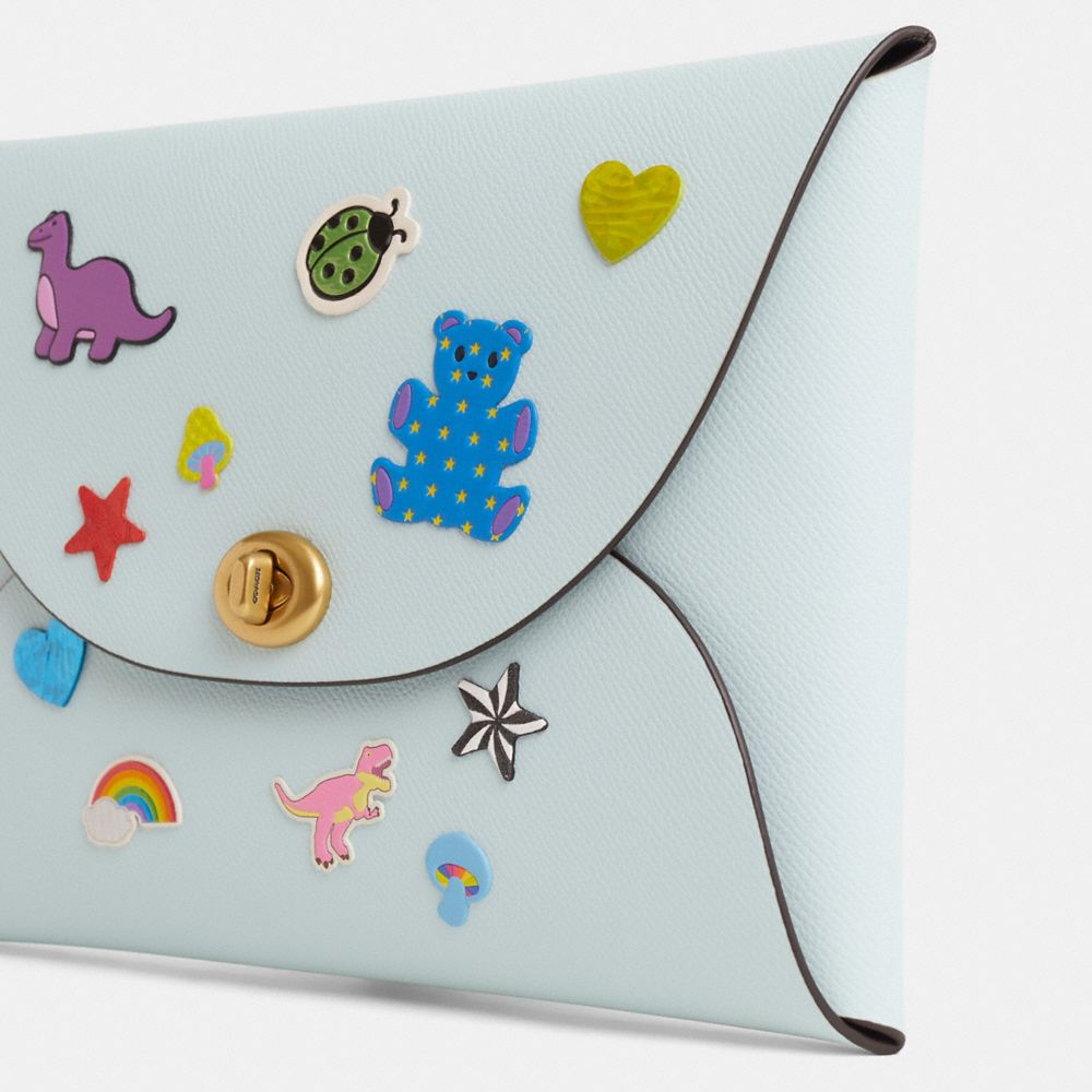 COACH®,Remade Extra Large Pouch With Stickers,,Closer View