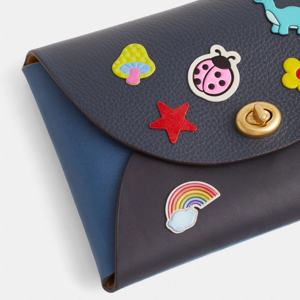 COACH®,Remade Large Colorblock Pouch With Stickers,,Closer View