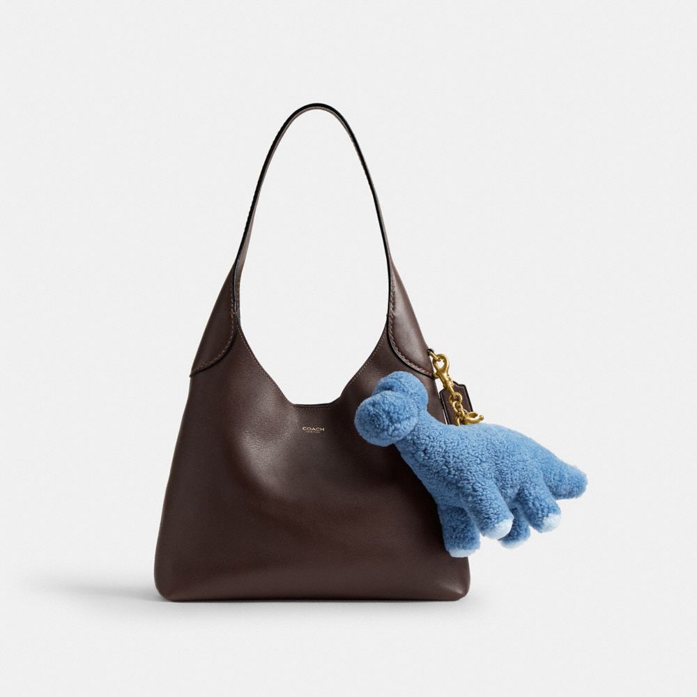 Женские брелоки Coach Rexy 10th Birthday Buddy Dinosaur Bag Charm In Shearling — фото 2