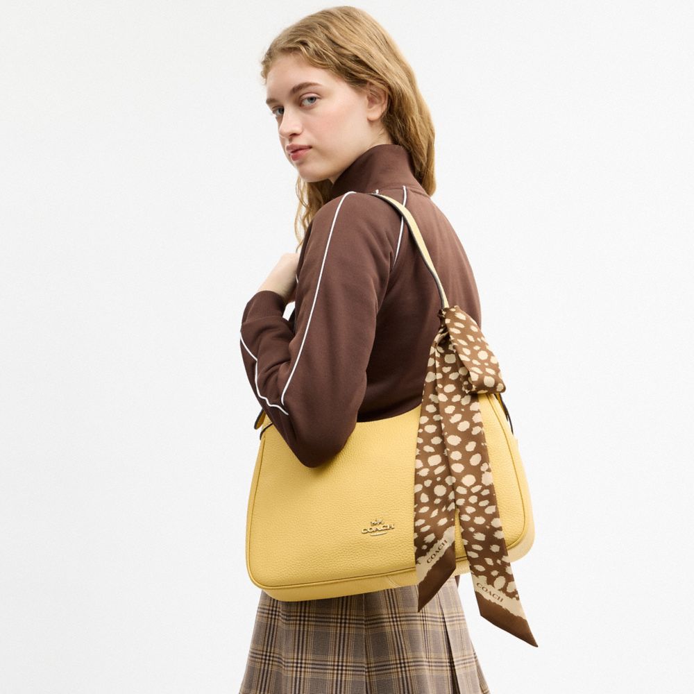 COACH®,FOULARD SKINNY EN SOIE AVEC MOTIF WILD SPOTS,Bronzé,Detail View