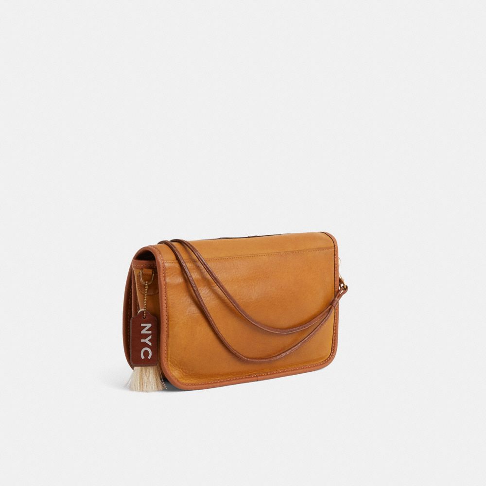 COACH®,Upcrafted Vintage Convertible Clutch,,Angle View