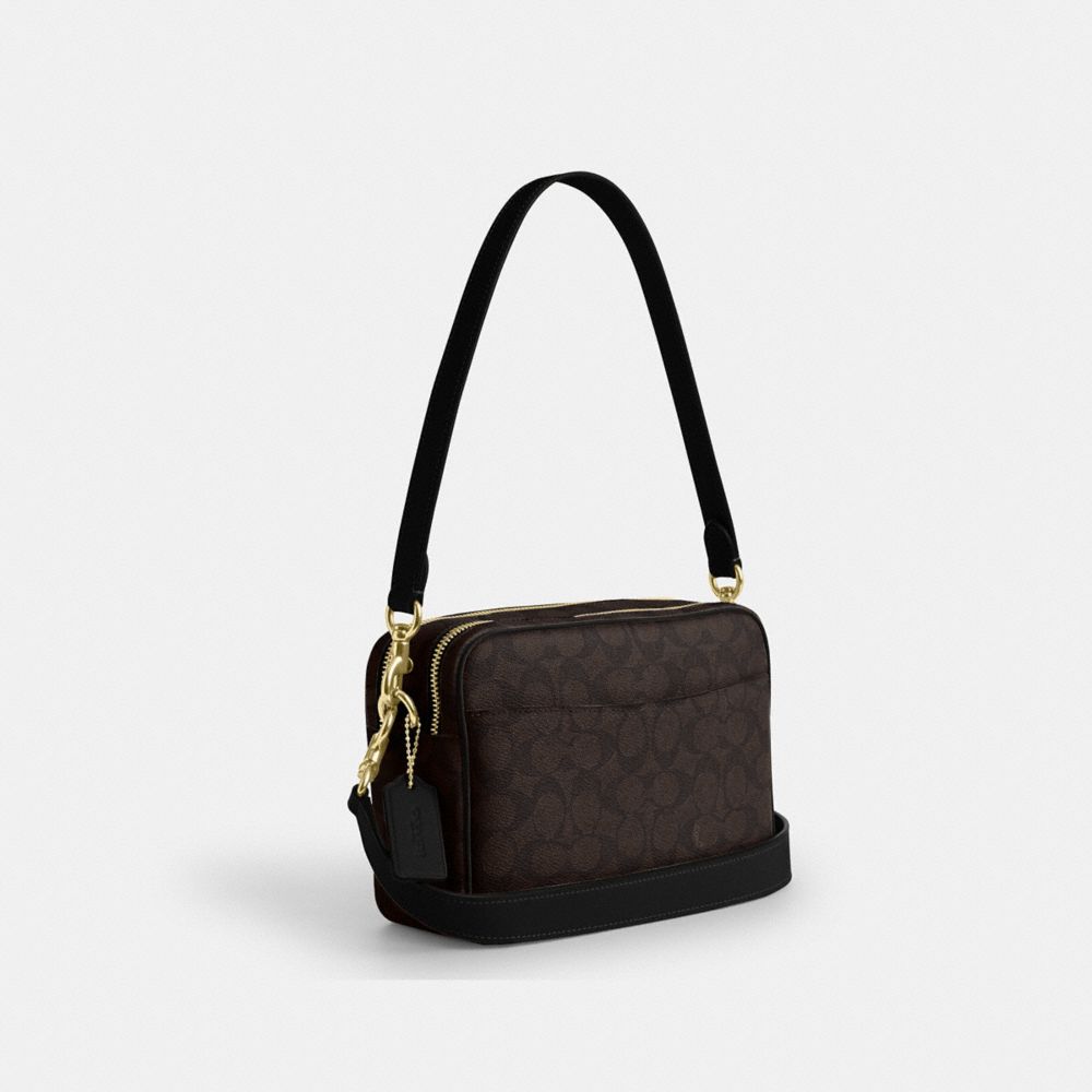 COACH®,Carey Crossbody Bag In Signature Canvas,Leather,Canvas,Recycled Polyester,Camera Bag,Metal,Logo,Sustainable,Gold Pl...,Brown,Angle View