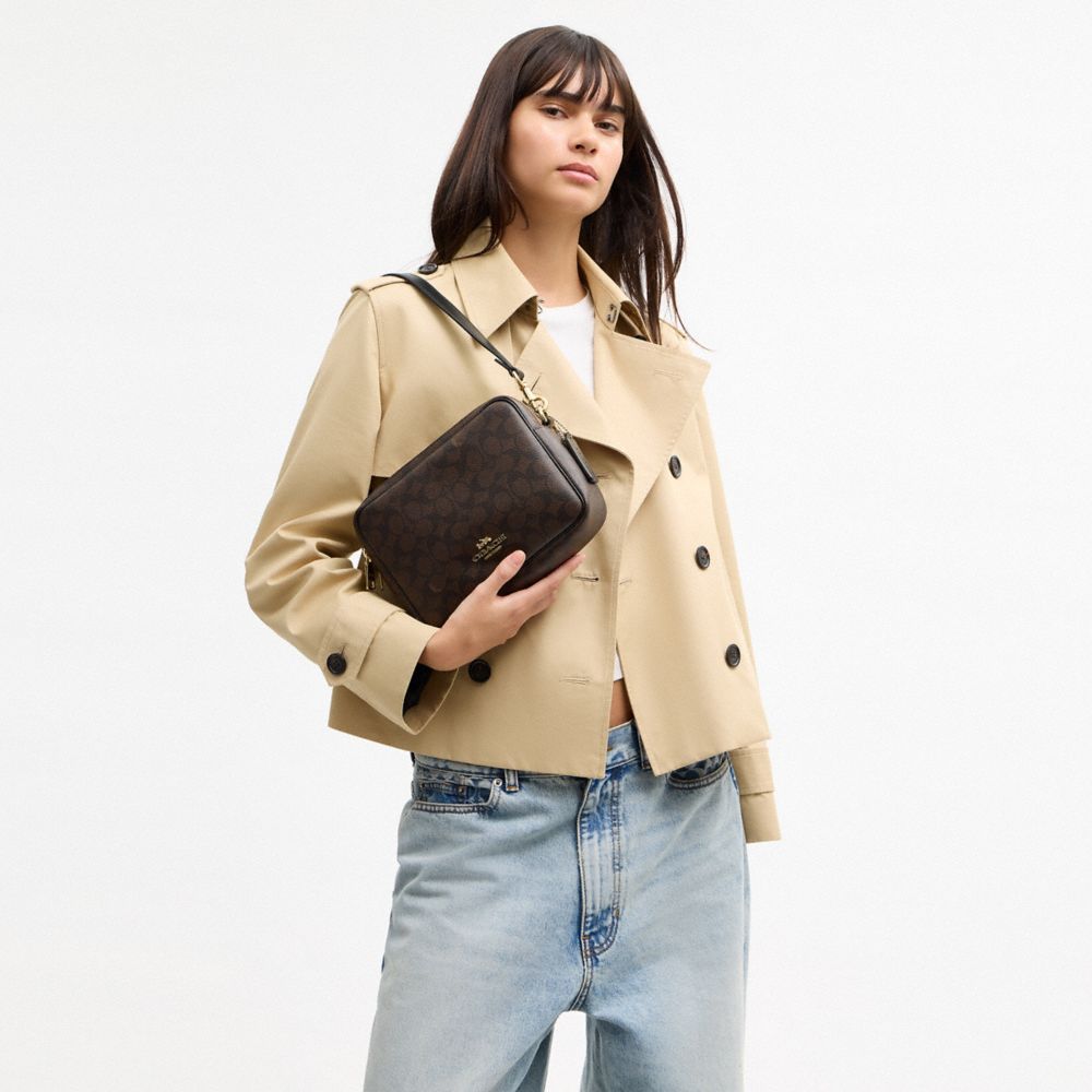 COACH®,Carey Crossbody Bag In Signature Canvas,Leather,Canvas,Recycled Polyester,Camera Bag,Metal,Logo,Sustainable,Gold Pl...,Brown,Detail View