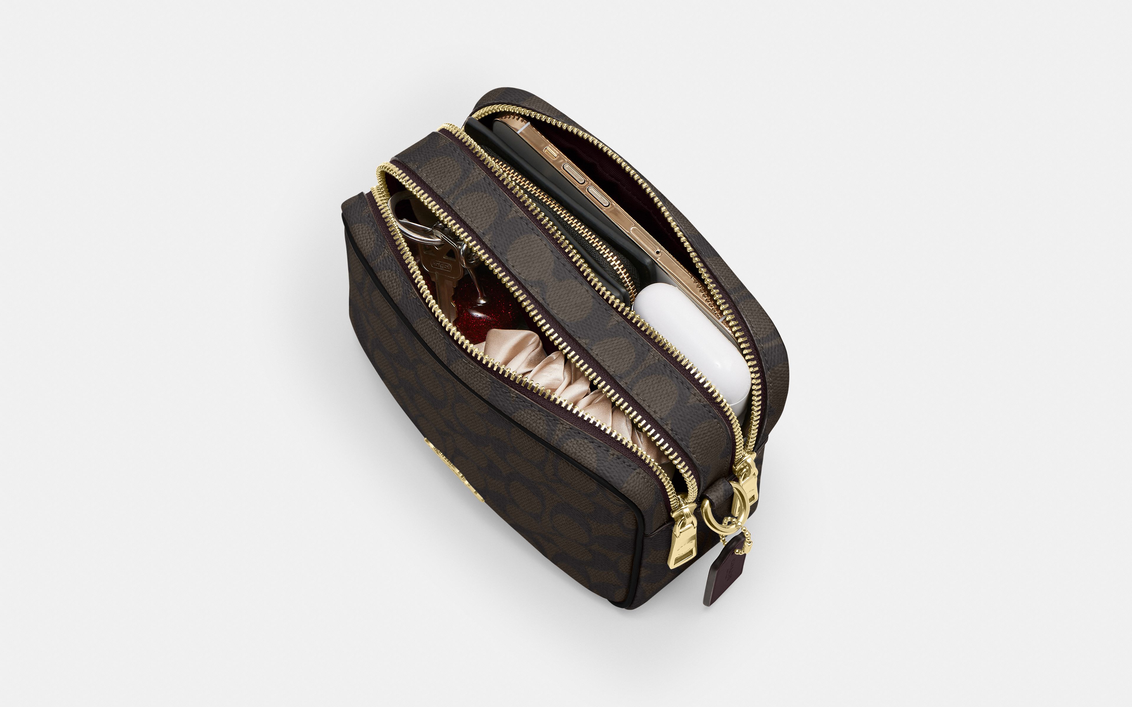 Mini Carey Crossbody Bag Signature Canvas
