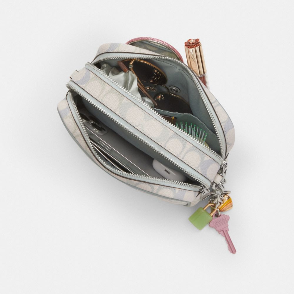 COACH®,Mini Carey Crossbody Bag In Signature Canvas,,Inside View,Top View